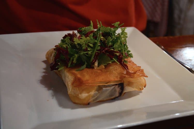 Blood sausage with apples in a crispy puff pastry at Le Bouchon des Filles