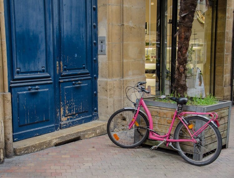 blue door and pink bicycle bordeaux